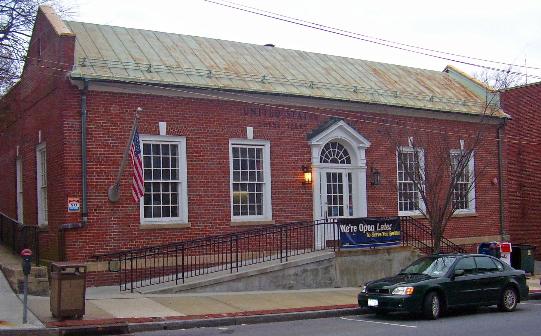 United States Post Office building exterior in Dobbs Ferry, NY — people-free street view