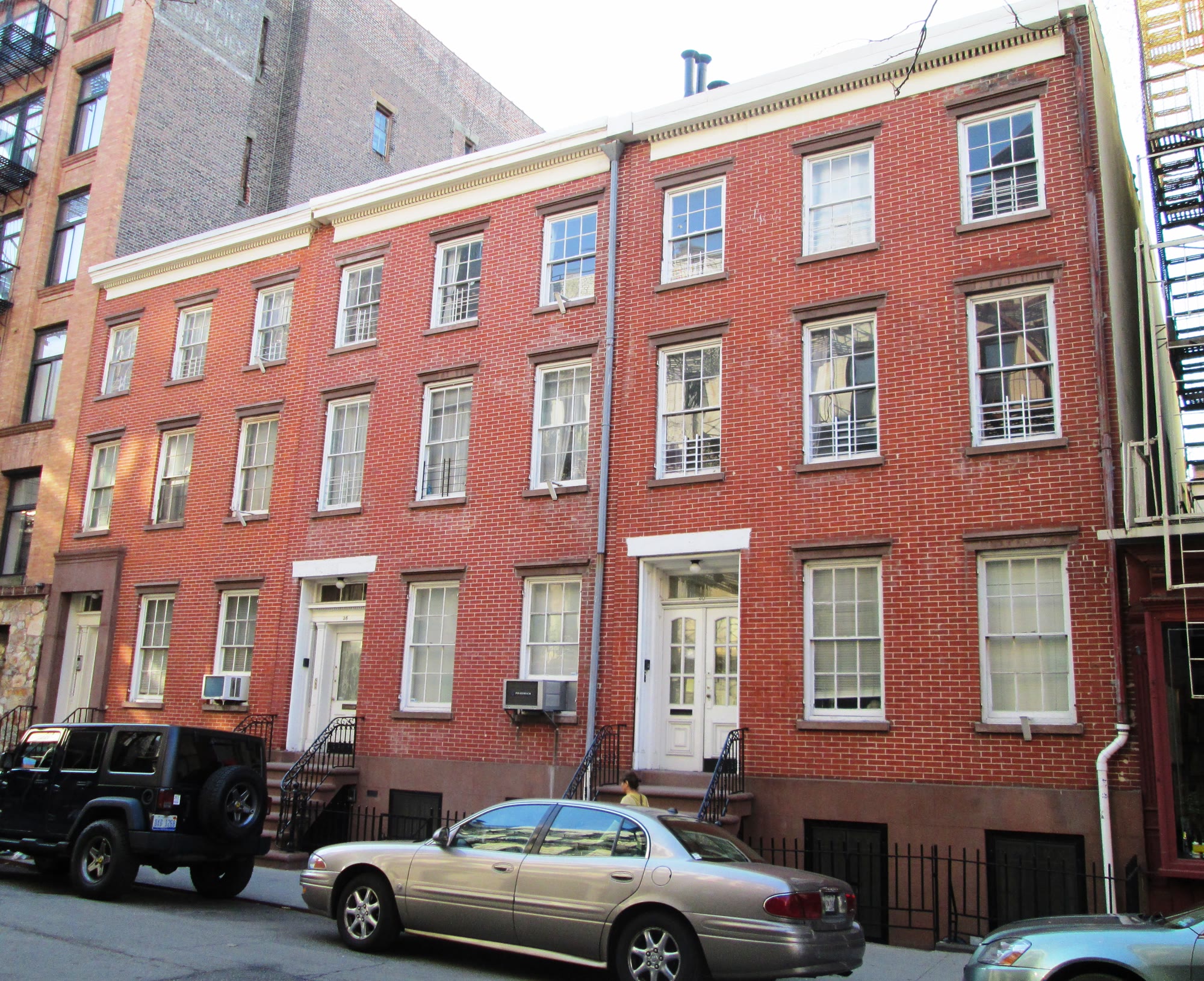 Brick townhouses on Jones Street in the West Village, Manhattan